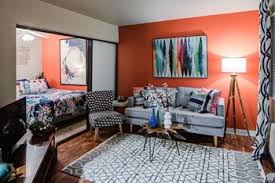 Living room with decorative fireplace and hardwood floors. Apartments For Rent Near Osu Rentcafe