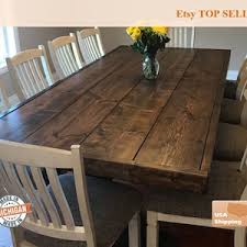 Counter height or bar height table with industrial pipe legs and reclaimed wood top. Rustic Dining Table Etsy