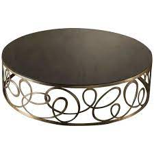 Located in new york, ny. Curving Round Coffee Table With Bronze Base And Marble Top For Sale At 1stdibs
