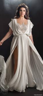 Romantic details like the soft tulle skirt, floral appliqué and blush hue make this the ethereal wedding dress of our dreams. Dror Kontento 2019 Plus Size Wedding Dresses Bridalpulse