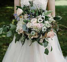 Modern wedding flowers perfect for a spring or summer wedding. Wedding Flowers Of Cream Green With A Touch Of Peach