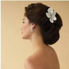 Another stylish way to let your hair down is to just clasp it loosely on both sides for some style. Asian Wedding Hairstyles 141 Available