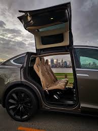 When elon musk introduced the tesla model x, the crowd oohed and aahed when he revealed that the car could open and close its doors automatically. I Took This Photo Of The Perth Skyline Through A Model X Backseat Teslamotors