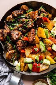 Pineapple Pork Stir Fry With Peppers Recipe The Modern Proper Recipe Healthy Pork Pork Recipes Stuffed Peppers