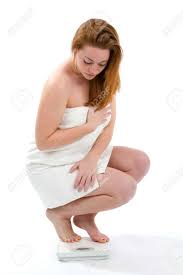 They can be made from a variety of cotton yarns. Woman Wrapped In A White Bath Towel Weighs Herself On A Bathroom Stock Photo Picture And Royalty Free Image Image 16796772