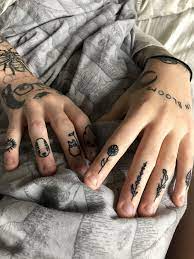 Fingertattoos Ghiblitattoo Flowers Studioghibli Fingertattoo Finger Tattoos Hand And Finger Tattoos Knuckle Tattoos