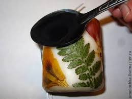 Once all the flowers are in place, you can set your wick with a little hot glue. Wonderful Diy Decorate Candles With Dry Flowers