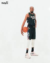 A multicolored stripe down the side of the uniform reflects a style that is prevalent in much of basquiat's. The Crossover On Twitter Kevin Durant In The Nets Basquiat Inspired City Edition Jerseys Via 35ventures Https T Co Eprqo8ej4s