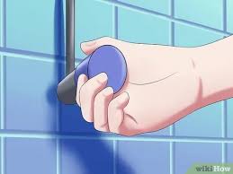 A baby bathtub will help you prop up a wriggling newborn. How To Give Your Baby A Bath When Traveling With Pictures