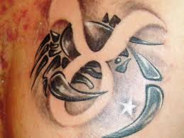 This cancer ribbon tattoo designs looks so meaningful with the wing. 70 Best Cancer Tattoos
