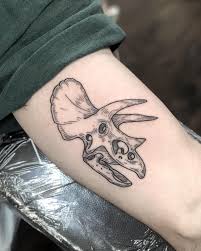 Rate This Triceratops Skull Tattoo 1 To 100 Tattoos Evolution Tattoo Gold Tattoo