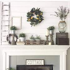 Because modern décor is currently extremely popular, it falls under the contemporary umbrella, adding to the confusion. Add A Farmhouse Like Appeal To Your Mantel Or The Fireplace Oh So Effortlessly Fireplace Mantel Decor Fireplace Mantle Decor Farmhouse Mantel Decorating Ideas