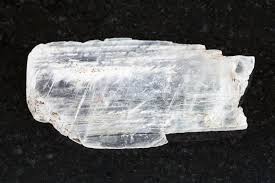 Sample of the sulfate mineral gypsum from the teaching collections of the paleontological research institution. Raw Crystal Of Gypsum Gemstone On Dark Stock Photo Image Of Ornamental Close 103207616