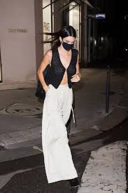 Reality television show keeping up with the kardash. Kendall Jenner Wears Sheer Single Buttoned Vest And White Culottes In Paris