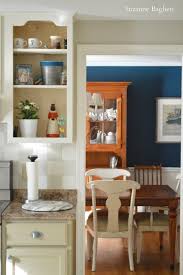 Learn step by step how to paint your kitchen cabinets for a durable lasting finish that will update and brighten your kitchen! Painted Kitchen Reveal