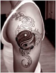 The sides of black and white are said to resemble a female and a male koi swimming together, representing the harmony of two opposite energies coming together as one, creating a perfect balance. 40 Amazing Yin Yang Tattoo Designs