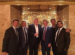 Trump tower is emblazoned on the front in bold gold block letters. Who S In Nigel Farage S Gold Brexit Gang Photo With Donald Trump The Independent The Independent