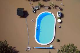 A Garden With A Swimming Pool Is Inundated By The Waters Of The Elbe River During Floods Near Magdeburg In The Federal State Of Saxony Anhalt June 10 201 Sjovt