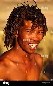 Young bushman of the San people, portrait, !Xaus Lodge, Kalahari or  Kglagadi Transfrontier Park, Northern Cape, South Africa Stock Photo