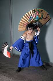 Having run away from the colony, anji is in possession of the zessen which takes the form of fans, and his fighting style involves japanese dancing steps. Uhyo ã†ã²ã‚‡ Anji Mito Cosplay Photo