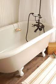 Bathtub refinishing is a far more economical alternative than replacing an antique claw foot tub. My Lil Helper And The Tub Bathroom Tub Tub Refinishing Clawfoot Tub