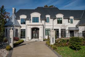 We painted the limestone to cover the 70s color in the rock. Cut Limestone King Masonry Yard Ltd