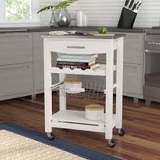 Nothing beats sitting in a comfy chair on your patio, sipping your favorite beverage, and enjoying the sounds and smells of nature. Winston Porter Macy Kitchen Cart With Stainless Steel Top Reviews Wayfair