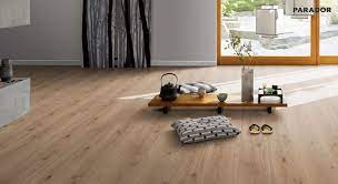 Laminate's wear layer does what it says: Parador Laminate Flooring Trendtime 6 Oak Castell Limed Engineered Wood Flooring 4v