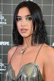 Margot debuted her major transformation, in which she donned a jet black wig on the set of david. Dua Lipa S Strawberry Blonde Hair Makeover Pics Hollywood Life