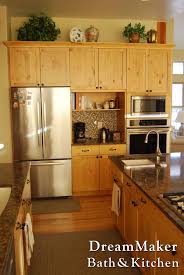Natural Knotty Alder Cabinetry Paired With Quartz Countertops Kitchen Design Complete Kitchens Kitchen Remodel