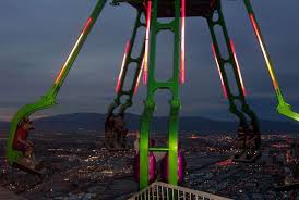 Teen equestrienne joanne link rides her american saddlebred on a dirt track with white stable buildings in the distance; The World S 30 Strangest Rides