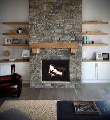 farmhouse modern boho living room fireplace stone veneers wood mantel stacked stone fireplaces stone walls interior living room with fireplace