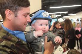 Emotional scenes as families welcome home 236 Irish troops from Lebanon  after six months away