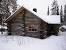 Inside Snowy Cabin In The Woods