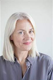 Photographic studio session for a 50 year old woman sitting on the floor and dressed in jeans and white shirt 50 Year Old Woman Portrait Pictures Stock Photos Getty Images Female Portrait Grey Hair Inspiration Great Hair