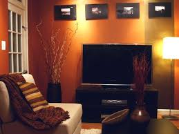 Sanchez Orange Living Room Entertainment Burnt Orange Living Room Decor Living Room Orange Orange Living Room Walls