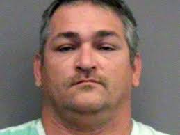 Florida prison employees with Klan ties arrested in murder plot