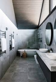 Dark hardwood flooring, stone brick bath surround, and bright natural wood paneling create an interesting mix of textures. 26 Chic And Stylish Grey Bathrooms Shelterness