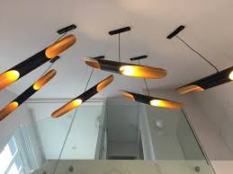 Design By Simon Chiang Singapore Based Architect Cement Screed Flooring Greys Muted Glass Lighting Chandelier Ceiling Lights Lighting Flooring