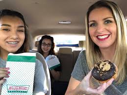 I'm Sarah May. I'm a manager at Krispy Kreme, to celebrate the start of  2025 we're giving every thumbs up with a free box of donuts 🍩