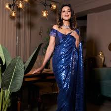 Sonali Bendres midnight blue Manish Malhotra sari is drenched in sequins |  Vogue India