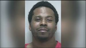 Motel workers slain; Man in custody