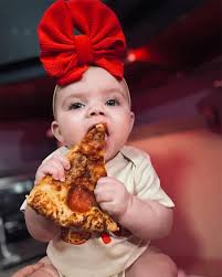 Our littlest (and biggest) fan! ❤️🍕 📸: Brooklyn Ratliff