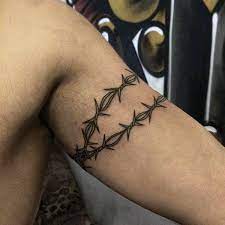 Black ink barbed wire tattoos. Top 61 Barbed Wire Tattoo Ideas 2021 Inspiration Guide