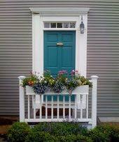 This turquoise door pairs well with simple front porch decor. Turquoise Front Door Sonya Hamilton Designs
