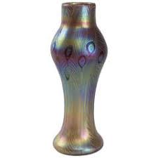 Detailed with green and turquoise peacock eye trails (otherwise known as 'cairngorm'). Peacock Vases 24 For Sale On 1stdibs