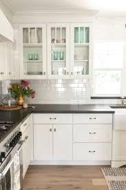 Best design ideas for white rustic kitchens. White Shaker Cabinetry With Glass Upper Cabinets As Featured On Rafterhouse Pilot Episode On Hgtv Kitchen Cabinets Decor Kitchen Renovation Kitchen Remodel