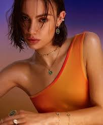 Catch the sun's rays with @messika Lucky Move malachite collection, where  deep green meets warm gold and dazzling diamonds. #Messika  #MessikaSummerVibes