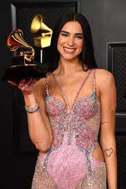 35,687 times across the course of the last year, it was only a matter of time before dua lipa scored. Dua Lipa S Epic Grammys Versace Dress Twinkled Like The Northern Lights British Vogue