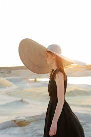 Broad Brimmed Hathat With A Wide Brimhat For Etsy Big Hat Photoshoot Big Hat Desert Fashion Editorial